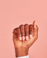 OPI Nail Polish in You've Got Nata On Me NLL17 featuring a glossy pink nail polish on neatly manicured nails.