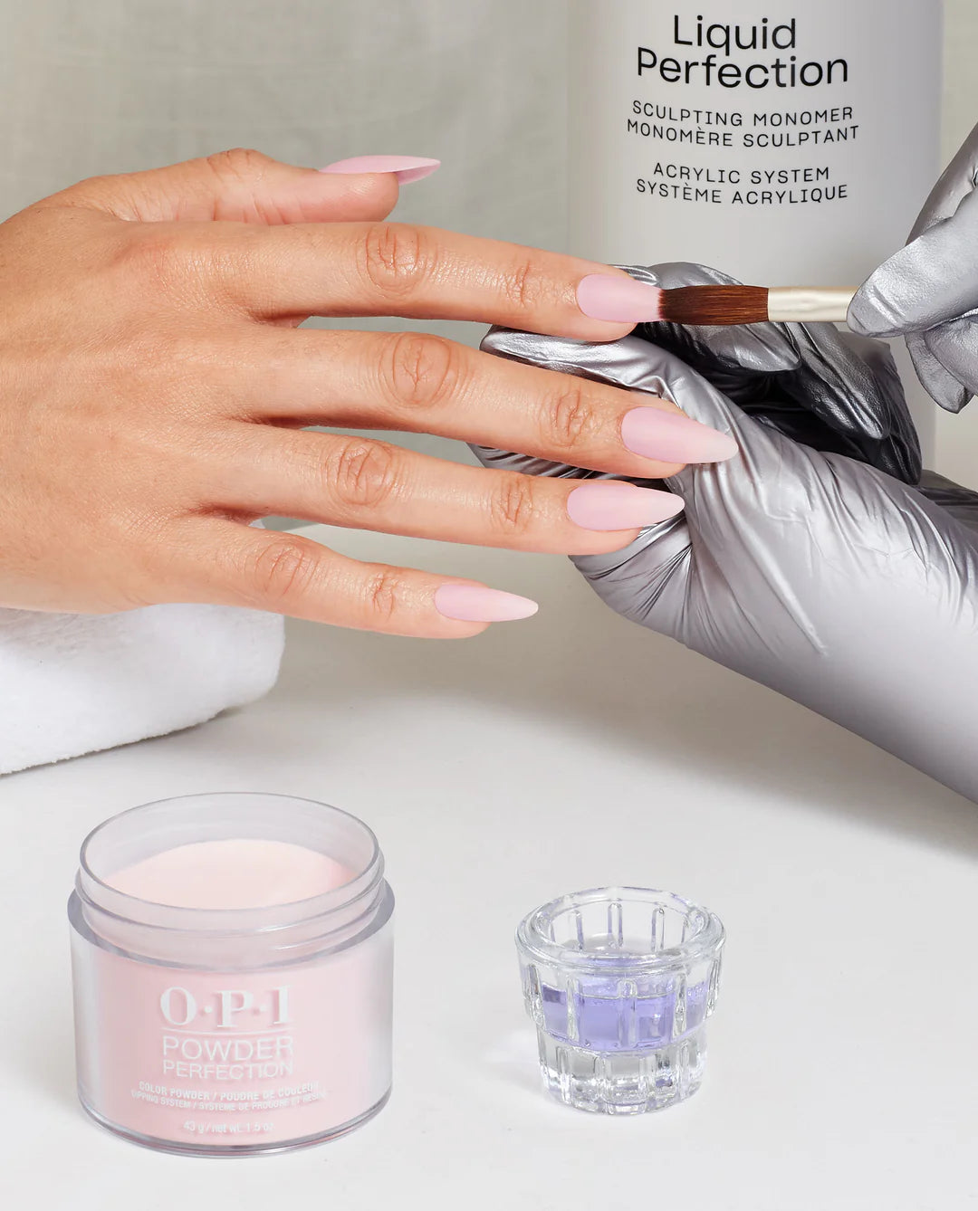 OPI Powder Perfection Baby Take a Vow powder nail color in a dipping powder application with pinkish nude shade.
