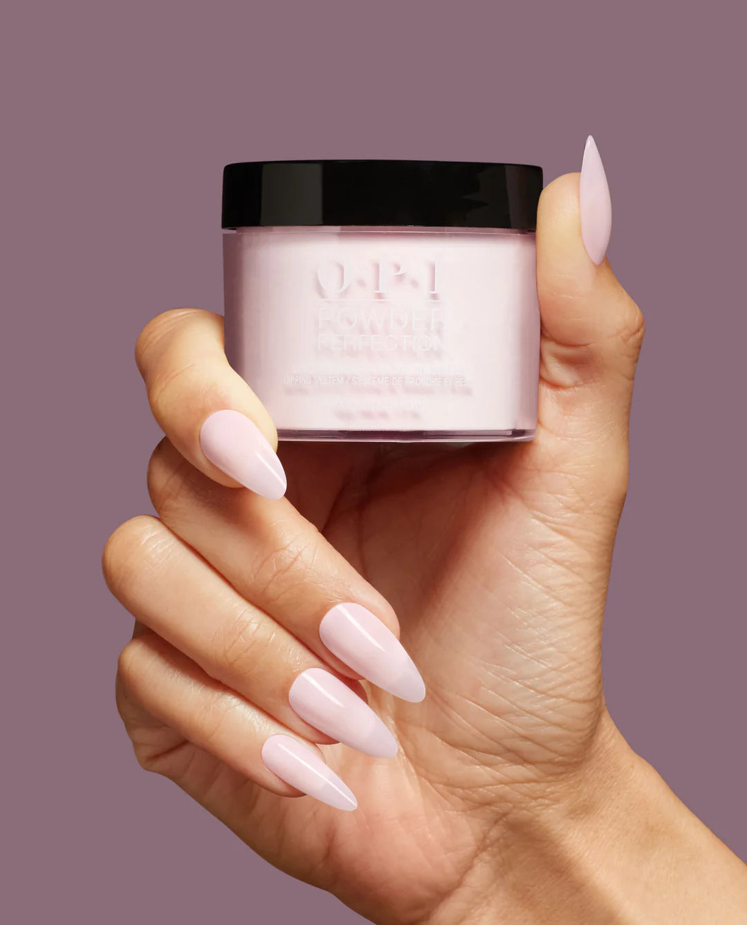OPI Powder Perfection Baby, Take a Vow powder nail color bottle and a hand with freshly dipped nails in the shade.