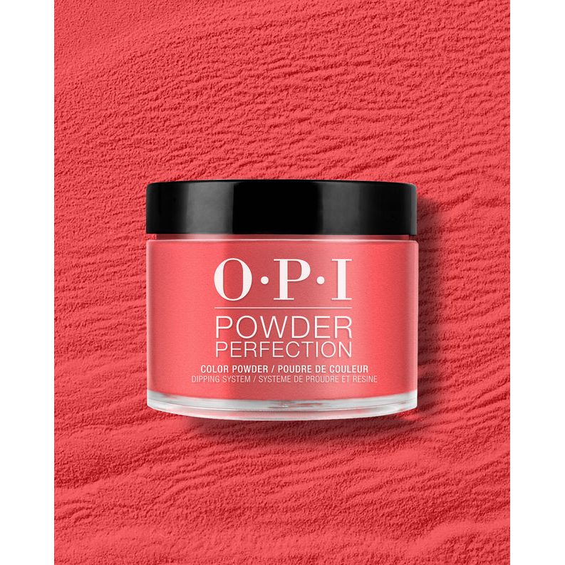 OPI Powder Perfection Cajun Shrimp #DPL64 dipping powder nail color applied on nails with a vibrant coral-pink finish.