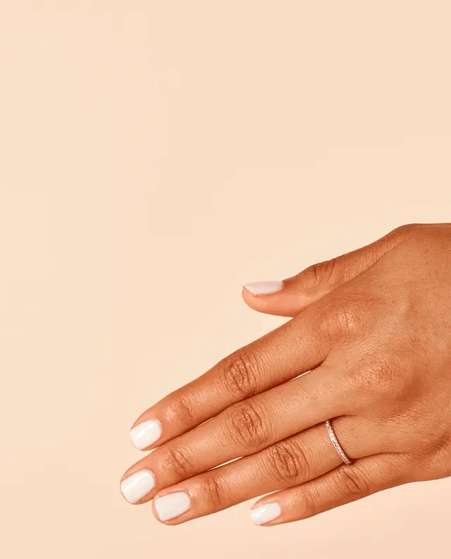 OPI Powder Perfection Funny Bunny powder nail color in a soft pastel shade, displayed on a nail with smooth, glossy finish.
