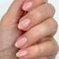 Orly Gel FX Builder in a Bottle concealer gel nail polish applied on a hand, 0.6oz bottle, part of Orly Treatments collection.