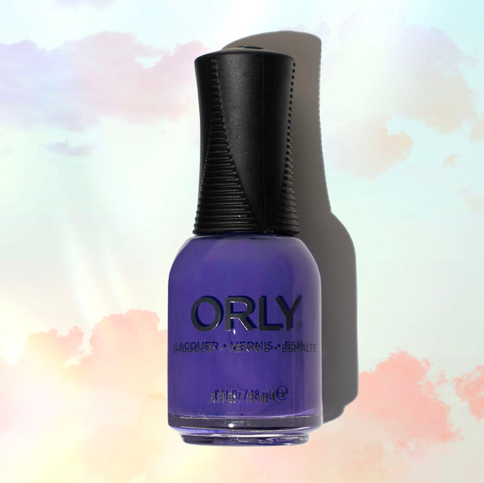 Orly Indigo Skies nail polish bottle with vibrant blue lacquer and clear cap, showcasing the Orly brand.