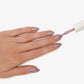 Sirooni Professional Top Coat in Simple Grey 15ml, clear bottle showing the grey-colored nail top coat inside.