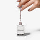 Sirooni Professional grey top coat in a 15ml bottle, providing a smooth, protective finish for nails.