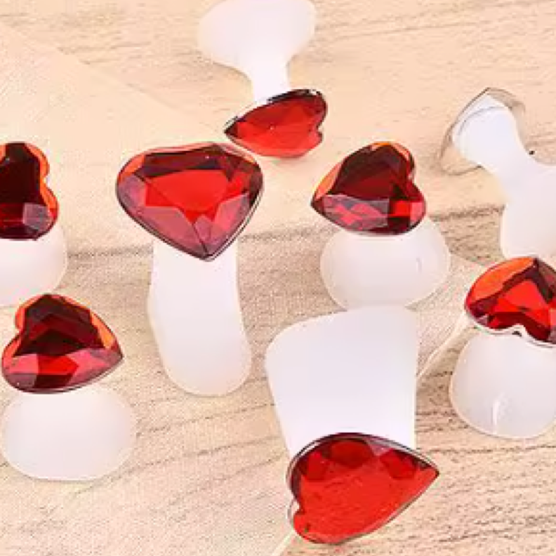 UNS 8-piece soft silicone heart-shaped toe separators for nail care, featuring comfortable, flexible design for pedicure treatments.