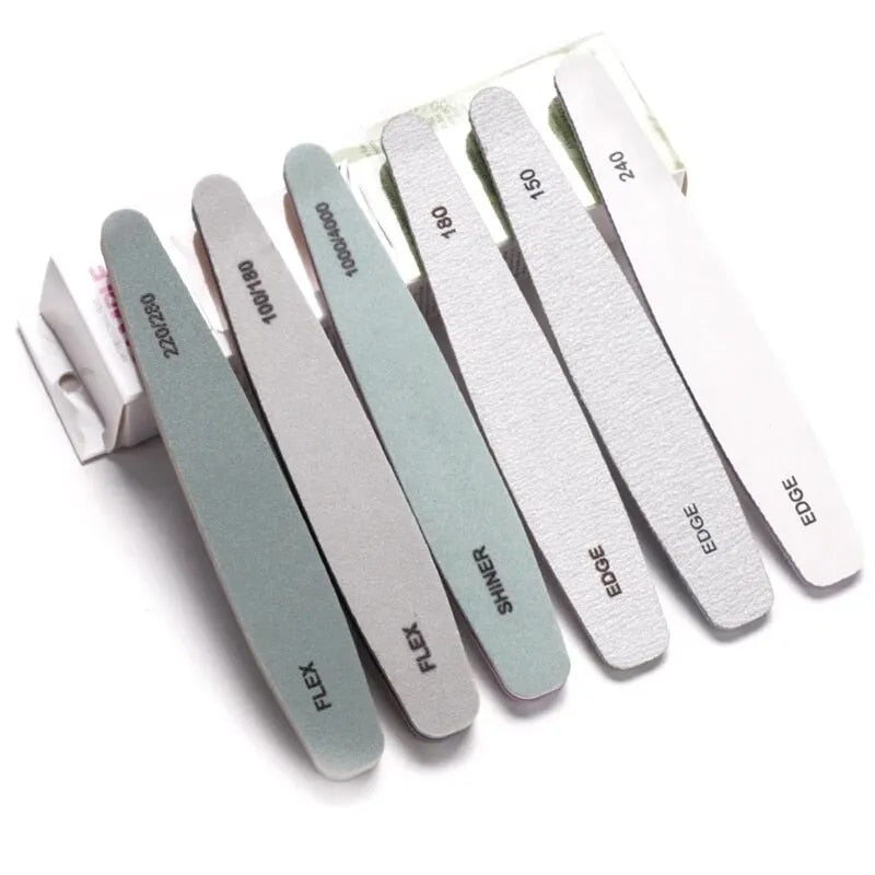 UNS professional 6-piece nail files and buffers set with sponge buffers, ideal for nail shaping, polishing, and buffing.