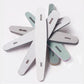 Set of six UNS professional nail files and buffers, featuring smooth and textured surfaces for nail shaping and polishing.