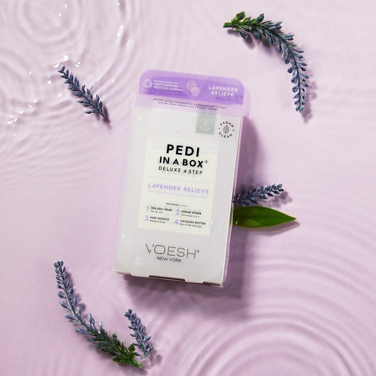 Voesh Pedi In A Box Lavender Relieve 4 Step set with foot soak, scrub, mask, and moisturizer for relaxing pedicure treatment.
