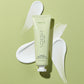 Voesh vegan body lotion with green tea in a 3oz tube, featuring a sleek design and clear packaging.