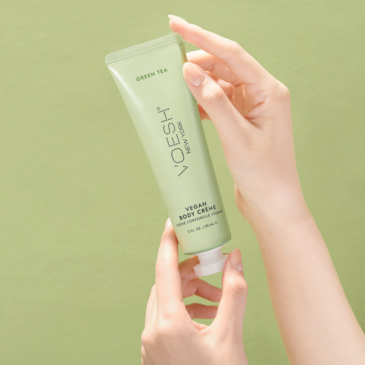 Voesh Vegan Body Crème 3oz, green tea scented body lotion in a clear 3-ounce container with a white cap.
