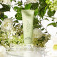 Voesh vegan body lotion with green tea scent in a 3oz container, moisturizing and nourishing skin.