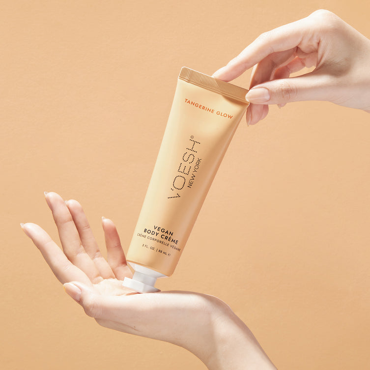 Voesh vegan body crème in 3oz container with tangerine scent, creamy lotion for moisturizing skin.